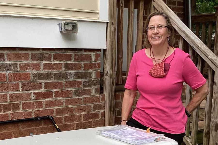 CMC Electric customer with home protection plan documents