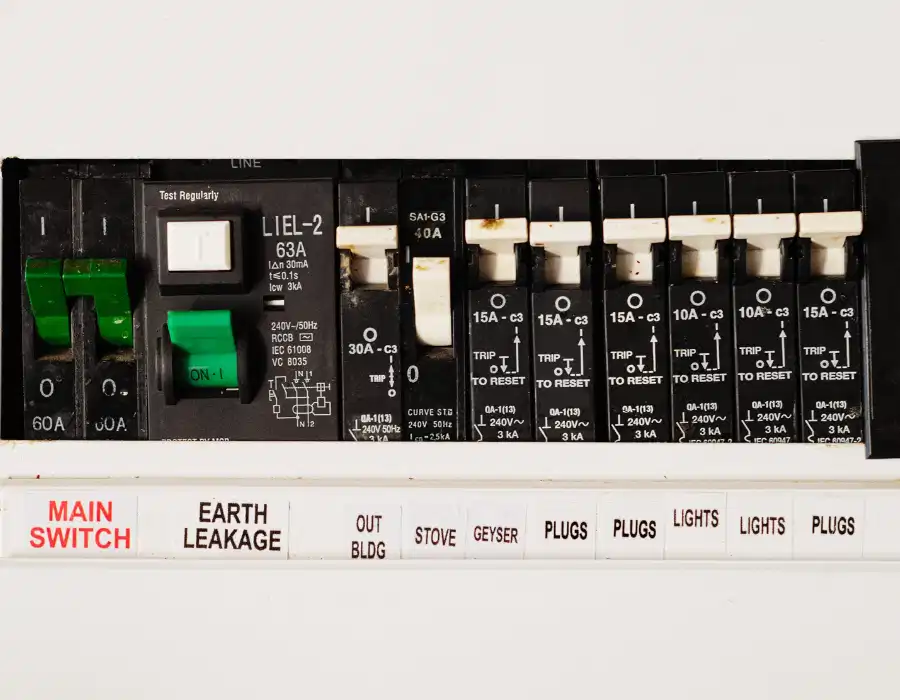 Close-up of an electrical panel with circuit breakers for home safety upgrades